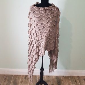 Womens Asymmetrical poncho.